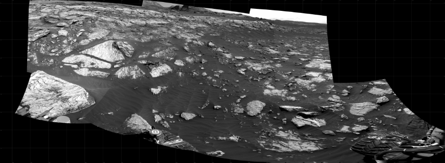 NASA's Mars rover Curiosity took 10 images in Gale Crater using its mast-mounted Right Navigation Camera (Navcam) to create this mosaic. The seam-corrected mosaic provides a 245-degree cylindrical projection panorama of the Martian surface centered at 236 degrees azimuth (measured clockwise from north). Curiosity took the images on April 07, 2021, Sol 3081 of the Mars Science Laboratory mission at drive 1958, site number 87. The local mean solar time for the image exposures was from 2 PM to 4 PM. Each Navcam image has a 45 degree field of view. CREDIT: NASA/JPL-Caltech