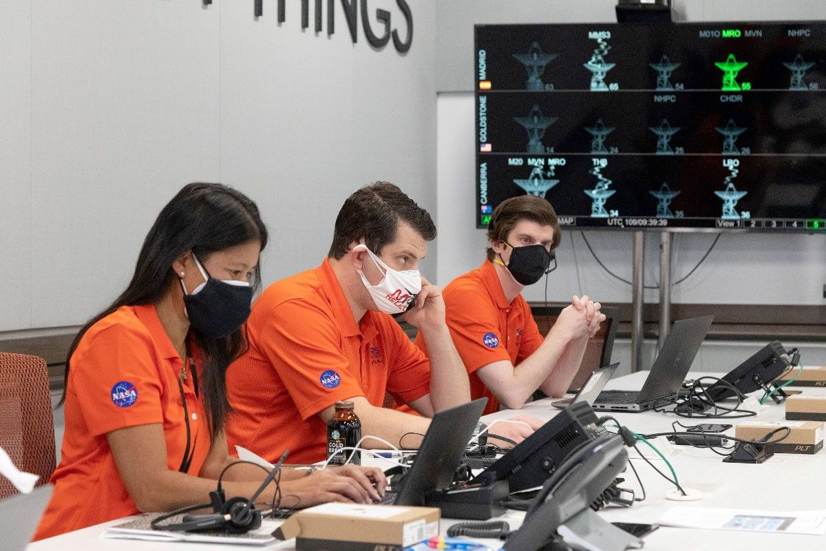Members of NASA’s Ingenuity helicopter team in the Space Flight Operations Facility at NASA’s Jet Propulsion Laboratory prepare to receive the data downlink showing whether the helicopter completed its first flight on April 19, 2021.