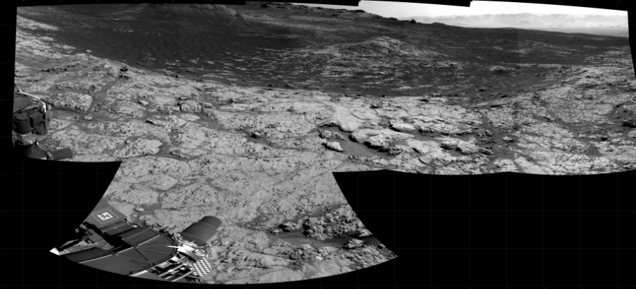 NASA's Mars rover Curiosity took 6 images in Gale Crater using its mast-mounted Right Navigation Camera (Navcam) to create this mosaic. The seam-corrected mosaic provides a 171-degree cylindrical projection panorama of the Martian surface centered at 240 degrees azimuth (measured clockwise from north). Curiosity took the images on June 02, 2021, Sol 3136 of the Mars Science Laboratory mission at drive 804, site number 88. The local mean solar time for the image exposures was 2 PM. Each Navcam image has a 45 degree field of view. CREDIT: NASA/JPL-Caltech
