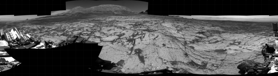 NASA's Mars rover Curiosity took 22 images in Gale Crater using its mast-mounted Right Navigation Camera (Navcam) to create this mosaic. The seam-corrected mosaic provides a 360-degree cylindrical projection panorama of the Martian surface centered at 202 degrees azimuth (measured clockwise from north). Curiosity took the images on June 10, 2021, Sol 3143 of the Mars Science Laboratory mission at drive 2130, site number 88. The local mean solar time for the image exposures was 1 PM. Each Navcam image has a 45 degree field of view. CREDIT: NASA/JPL-Caltech