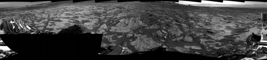 NASA's Mars rover Curiosity took 19 images in Gale Crater using its mast-mounted Right Navigation Camera (Navcam) to create this mosaic. The seam-corrected mosaic provides a 360-degree cylindrical projection panorama of the Martian surface centered at 200 degrees azimuth (measured clockwise from north). Curiosity took the images on June 12, 2021, Sol 3145 of the Mars Science Laboratory mission at drive 2422, site number 88. The local mean solar time for the image exposures was 3 PM. Each Navcam image has a 45 degree field of view. CREDIT: NASA/JPL-Caltech