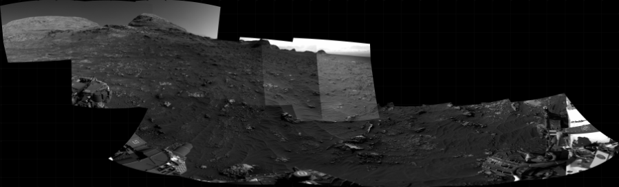 NASA's Mars rover Curiosity took 15 images in Gale Crater using its mast-mounted Right Navigation Camera (Navcam) to create this mosaic. The seam-corrected mosaic provides a 340-degree cylindrical projection panorama of the Martian surface centered at 290 degrees azimuth (measured clockwise from north). Curiosity took the images on June 25, 2021, Sol 3158 of the Mars Science Laboratory mission at drive 1466, site number 89. The local mean solar time for the image exposures was from 3 PM to 4 PM. Each Navcam image has a 45 degree field of view. CREDIT: NASA/JPL-Caltech
