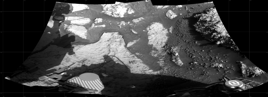 NASA's Mars rover Curiosity took 2 images in Gale Crater using its mast-mounted Right Navigation Camera (Navcam) to create this mosaic. The seam-corrected mosaic provides a 131-degree cylindrical projection panorama of the Martian surface centered at 154 degrees azimuth (measured clockwise from north). Curiosity took the images on July 02, 2021, Sol 3165 of the Mars Science Laboratory mission at drive 1992, site number 89. The local mean solar time for the image exposures was 3 PM. Each Navcam image has a 45 degree field of view. CREDIT: NASA/JPL-Caltech