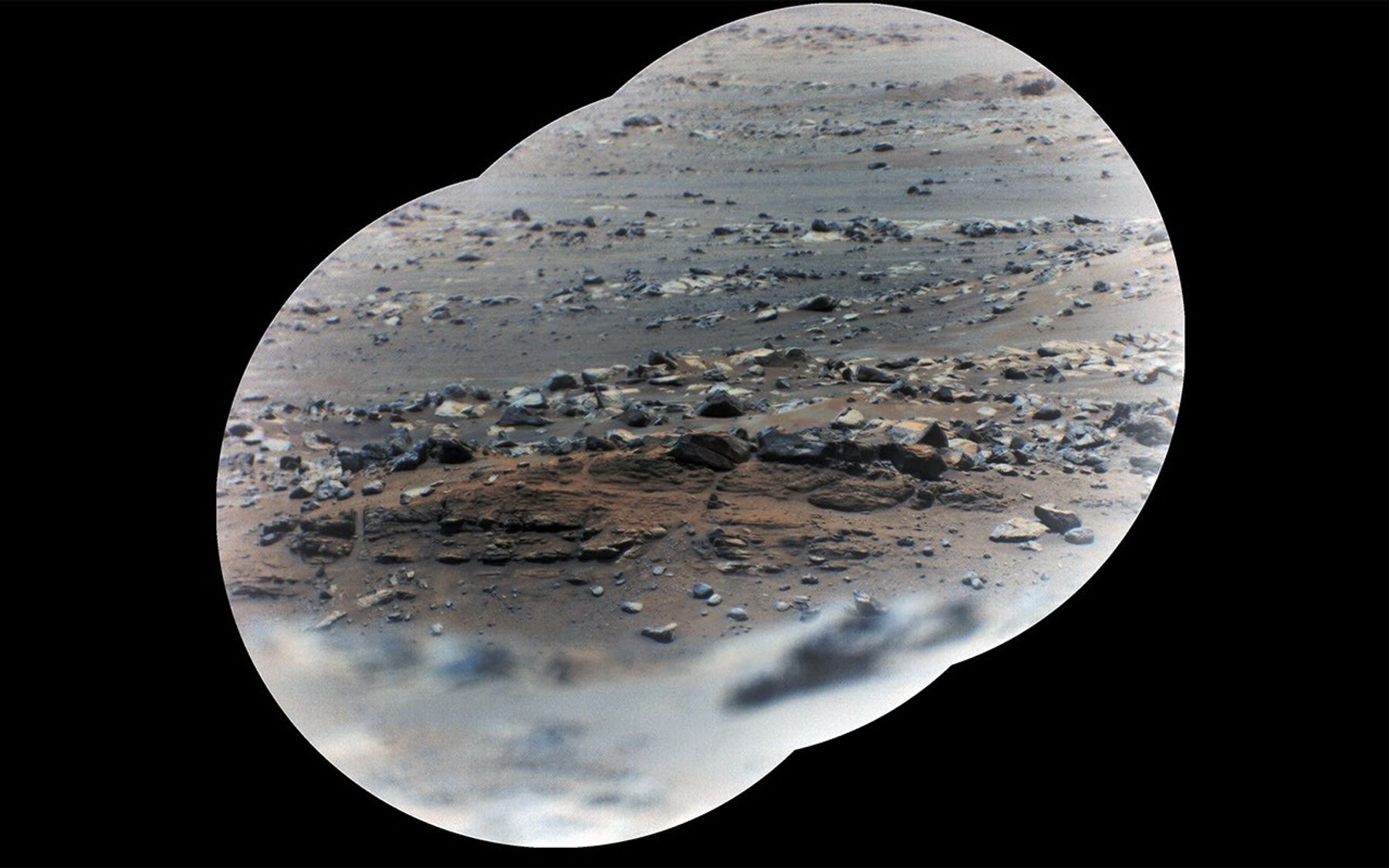 NASA’s Perseverance rover took these zoomed-in images of a layered outcrop (just below center of   image) nicknamed “Artuby” on June 17, 2021 (the 116th sol, or Martian Day, of its mission), from a little more than a third of a mile (615 meters) away.