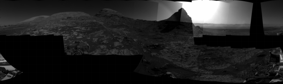 NASA's Mars rover Curiosity took 21 images in Gale Crater using its mast-mounted Right Navigation Camera (Navcam) to create this mosaic. The seam-corrected mosaic provides a 360-degree cylindrical projection panorama of the Martian surface centered at 233 degrees azimuth (measured clockwise from north). Curiosity took the images on July 23, 2021, Sol 3185 of the Mars Science Laboratory mission at drive 2380, site number 89. The local mean solar time for the image exposures was 3 PM. Each Navcam image has a 45 degree field of view. CREDIT: NASA/JPL-Caltech