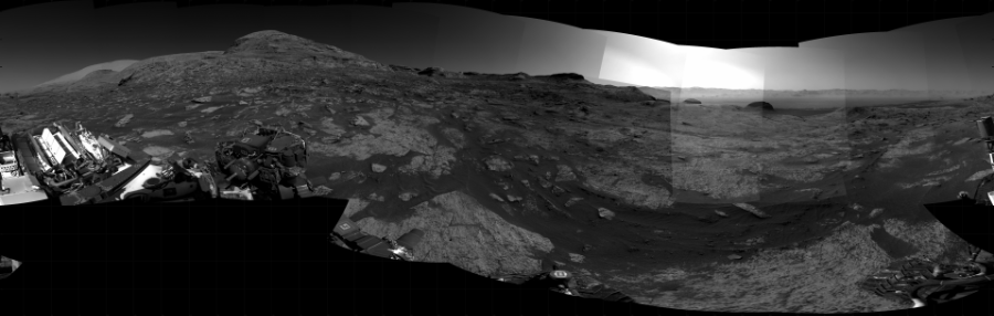 NASA's Mars rover Curiosity took 29 images in Gale Crater using its mast-mounted Right Navigation Camera (Navcam) to create this mosaic. The seam-corrected mosaic provides a 360-degree cylindrical projection panorama of the Martian surface centered at 242 degrees azimuth (measured clockwise from north). Curiosity took the images on August 09, 2021, Sol 3202 of the Mars Science Laboratory mission at drive 1102, site number 90. The local mean solar time for the image exposures was 2 PM. Each Navcam image has a 45 degree field of view. CREDIT: NASA/JPL-Caltech