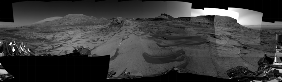 NASA's Mars rover Curiosity took 32 images in Gale Crater using its mast-mounted Right Navigation Camera (Navcam) to create this mosaic. The seam-corrected mosaic provides a 360-degree cylindrical projection panorama of the Martian surface centered at 215 degrees azimuth (measured clockwise from north). Curiosity took the images on September 06, 2021, Sols 3229-3222 of the Mars Science Laboratory mission at drive 390, site number 91. The local mean solar time for the image exposures was from 2 PM to 3 PM. Each Navcam image has a 45 degree field of view. CREDIT: NASA/JPL-Caltech