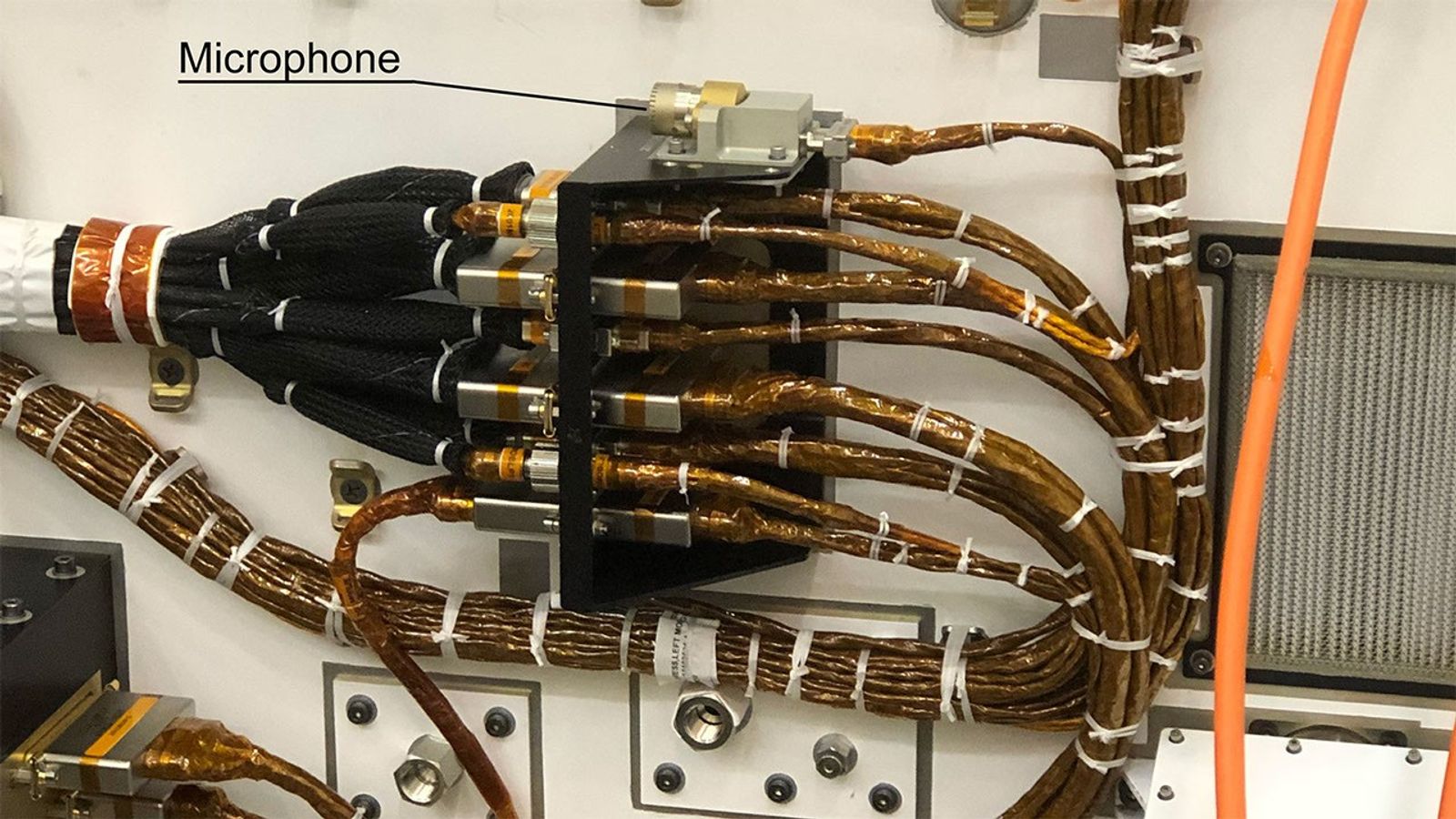 NASA’s Perseverance Mars rover carries two commercial-grade microphones, including this one on its chassis.