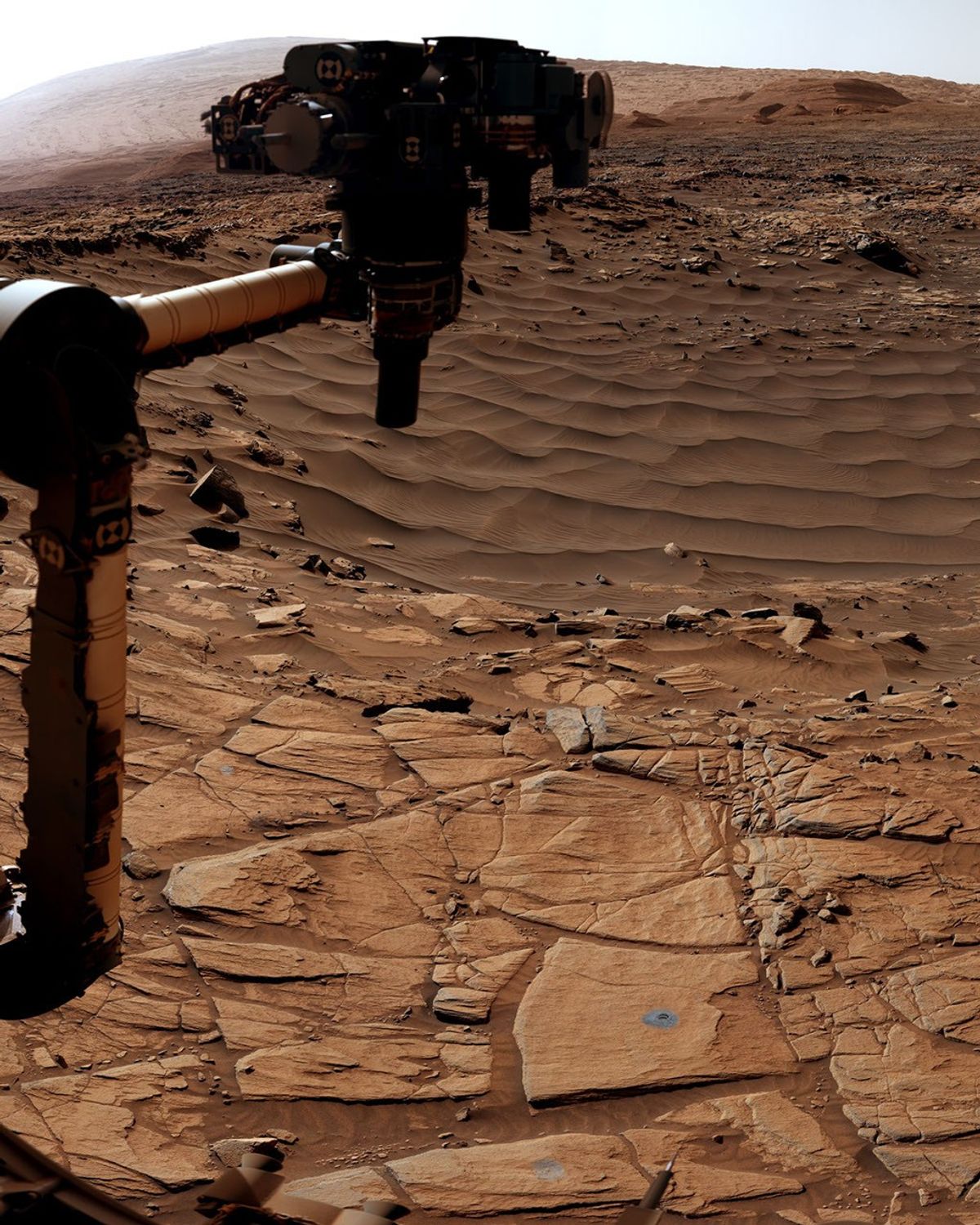 NASA’s Curiosity Mars rover used its Mast Camera, or Mastcam, to capture this scene of a drill hole named “Edinburgh.” The images used to create the scene were taken on March 22 and 23, 2020, which were the 2,711th and 2,712th Martian days, or sols, of the mission.