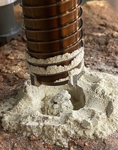 Engineers at NASA’s Jet Propulsion Laboratory performed tests on rocks such as this one to understand why the first attempt by the agency’s Perseverance rover resulted in a powderized sample. A duplicate of the rover’s drill attempted to create cores from crumbly rocks.