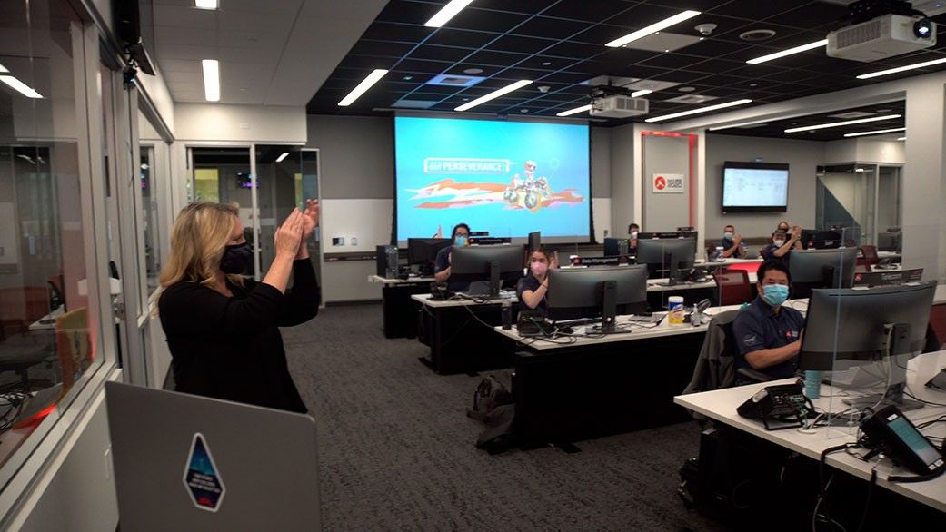 Jennifer Trosper, Mars Perseverance project manager, leads rover team members at JPL in a round of applause for students who were honored through the “You’ve Got Perseverance” campaign for overcoming obstacles in pursuit of their educational goals.