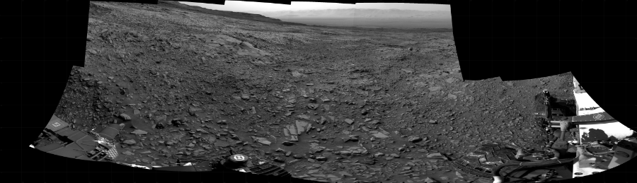 NASA's Mars rover Curiosity took 12 images in Gale Crater using its mast-mounted Right Navigation Camera (Navcam) to create this mosaic. The seam-corrected mosaic provides a 284-degree cylindrical projection panorama of the Martian surface centered at 283 degrees azimuth (measured clockwise from north). Curiosity took the images on March 18, 2022, Sol 3417 of the Mars Science Laboratory mission at drive 3240, site number 93. The local mean solar time for the image exposures was 2 PM. Each Navcam image has a 45 degree field of view. CREDIT: NASA/JPL-Caltech