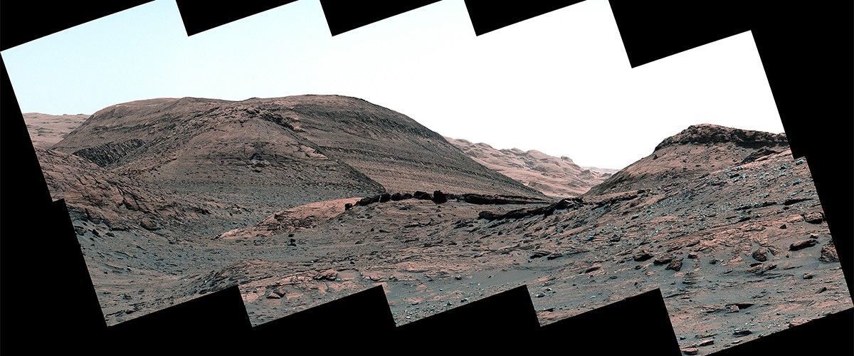 NASA’s Curiosity Mars rover captured this view of a sulfate-bearing region using its Mastcam on May 2, 2022, the 3,462nd Martian day, or sol, of the mission – dark boulders seen near the center are thought to have formed from sand deposited in ancient streams or ponds.