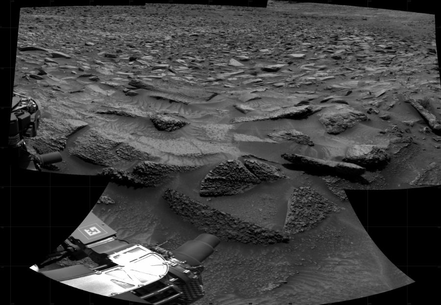 NASA's Mars rover Curiosity took 4 images in Gale Crater using its mast-mounted Right Navigation Camera (Navcam) to create this mosaic. The seam-corrected mosaic provides a 111-degree cylindrical projection panorama of the Martian surface centered at 203 degrees azimuth (measured clockwise from north). Curiosity took the images on September 19, 2022, Sol 3597 of the Mars Science Laboratory mission at drive 1434, site number 97. The local mean solar time for the image exposures was 1 PM. Each Navcam image has a 45 degree field of view. CREDIT: NASA/JPL-Caltech