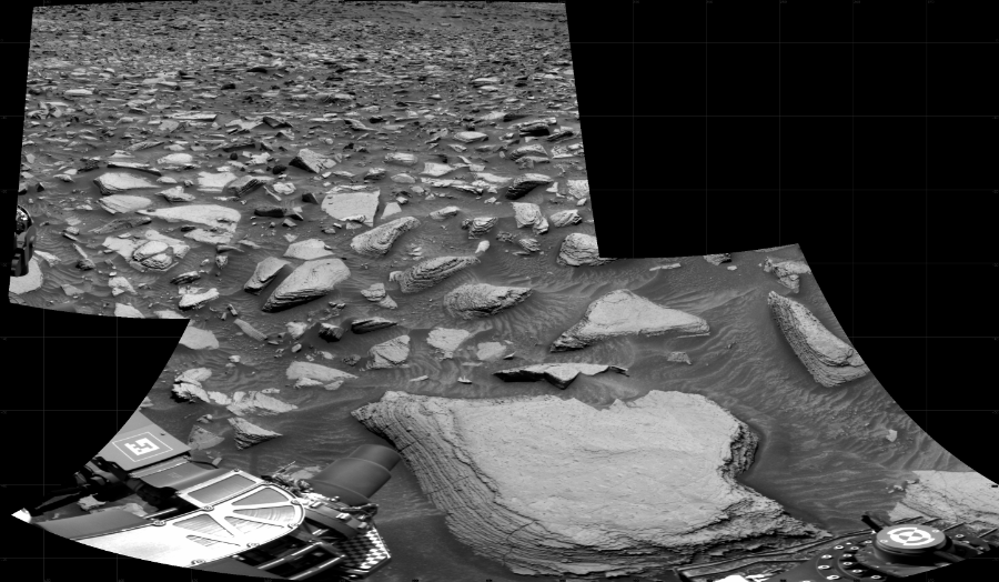 NASA's Mars rover Curiosity took 4 images in Gale Crater using its mast-mounted Right Navigation Camera (Navcam) to create this mosaic. The seam-corrected mosaic provides a 136-degree cylindrical projection panorama of the Martian surface centered at 212 degrees azimuth (measured clockwise from north). Curiosity took the images on September 28, 2022, Sol 3606 of the Mars Science Laboratory mission at drive 1716, site number 97. The local mean solar time for the image exposures was 1 PM. Each Navcam image has a 45 degree field of view. CREDIT: NASA/JPL-Caltech