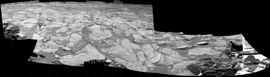 NASA's Mars rover Curiosity took 12 images in Gale Crater using its mast-mounted Right Navigation Camera (Navcam) to create this mosaic. The seam-corrected mosaic provides a 298-degree cylindrical projection panorama of the Martian surface centered at 245 degrees azimuth (measured clockwise from north). Curiosity took the images on January 09, 2023, Sol 3706 of the Mars Science Laboratory mission at drive 1256, site number 99. The local mean solar time for the image exposures was 3 PM. Each Navcam image has a 45 degree field of view. CREDIT: NASA/JPL-Caltech