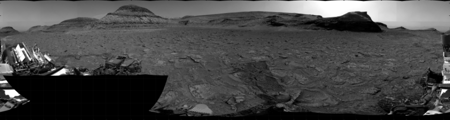 NASA's Mars rover Curiosity took 34 images in Gale Crater using its mast-mounted Right Navigation Camera (Navcam) to create this mosaic. The seam-corrected mosaic provides a 360-degree cylindrical projection panorama of the Martian surface centered at 195 degrees azimuth (measured clockwise from north). Curiosity took the images on January 21, 2023, Sols 3718-3715 of the Mars Science Laboratory mission at drive 1676, site number 99. The local mean solar time for the image exposures was from 2 PM to 4 PM. Each Navcam image has a 45 degree field of view. CREDIT: NASA/JPL-Caltech