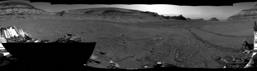 NASA's Mars rover Curiosity took 31 images in Gale Crater using its mast-mounted Right Navigation Camera (Navcam) to create this mosaic. The seam-corrected mosaic provides a 360-degree cylindrical projection panorama of the Martian surface centered at 256 degrees azimuth (measured clockwise from north). Curiosity took the images on February 03, 2023, Sol 3730 of the Mars Science Laboratory mission at drive 2414, site number 99. The local mean solar time for the image exposures was from 2 PM to 3 PM. Each Navcam image has a 45 degree field of view. CREDIT: NASA/JPL-Caltech