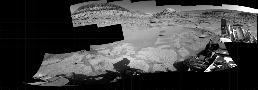 NASA's Mars rover Curiosity took 15 images in Gale Crater using its mast-mounted Right Navigation Camera (Navcam) to create this mosaic. The seam-corrected mosaic provides a 316-degree cylindrical projection panorama of the Martian surface centered at 117 degrees azimuth (measured clockwise from north). Curiosity took the images on February 22, 2023, Sol 3749 of the Mars Science Laboratory mission at drive 1084, site number 100. The local mean solar time for the image exposures was 3 PM. Each Navcam image has a 45 degree field of view. CREDIT: NASA/JPL-Caltech