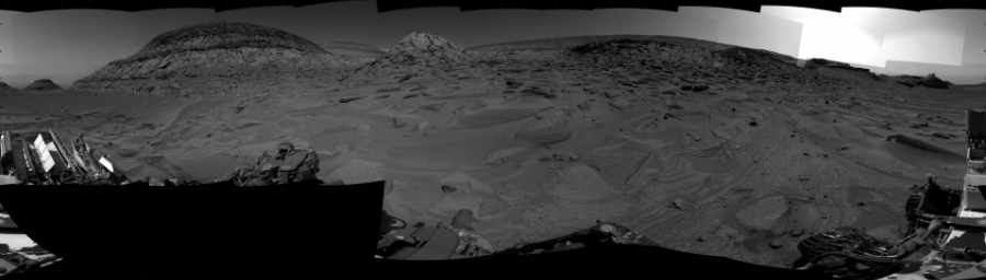 NASA's Mars rover Curiosity took 31 images in Gale Crater using its mast-mounted Right Navigation Camera (Navcam) to create this mosaic. The seam-corrected mosaic provides a 360-degree cylindrical projection panorama of the Martian surface centered at 177 degrees azimuth (measured clockwise from north). Curiosity took the images on March 20, 2023, Sol 3774 of the Mars Science Laboratory mission at drive 1376, site number 100. The local mean solar time for the image exposures was from 2 PM to 3 PM. Each Navcam image has a 45 degree field of view. CREDIT: NASA/JPL-Caltech