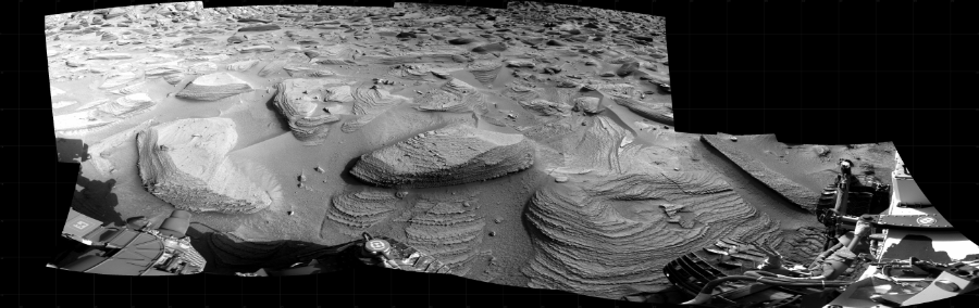 NASA's Mars rover Curiosity took 12 images in Gale Crater using its mast-mounted Right Navigation Camera (Navcam) to create this mosaic. The seam-corrected mosaic provides a 263-degree cylindrical projection panorama of the Martian surface centered at 226 degrees azimuth (measured clockwise from north). Curiosity took the images on March 22, 2023, Sol 3776 of the Mars Science Laboratory mission at drive 1586, site number 100. The local mean solar time for the image exposures was 4 PM. Each Navcam image has a 45 degree field of view. CREDIT: NASA/JPL-Caltech