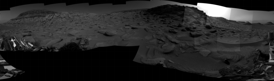 NASA's Mars rover Curiosity took 29 images in Gale Crater using its mast-mounted Right Navigation Camera (Navcam) to create this mosaic. The seam-corrected mosaic provides a 360-degree cylindrical projection panorama of the Martian surface centered at 200 degrees azimuth (measured clockwise from north). Curiosity took the images on March 27, 2023, Sol 3781 of the Mars Science Laboratory mission at drive 1982, site number 100. The local mean solar time for the image exposures was 3 PM. Each Navcam image has a 45 degree field of view. CREDIT: NASA/JPL-Caltech
