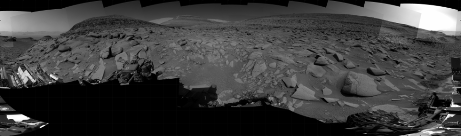NASA's Mars rover Curiosity took 31 images in Gale Crater using its mast-mounted Right Navigation Camera (Navcam) to create this mosaic. The seam-corrected mosaic provides a 360-degree cylindrical projection panorama of the Martian surface centered at 152 degrees azimuth (measured clockwise from north). Curiosity took the images on April 17, 2023, Sol 3801 of the Mars Science Laboratory mission at drive 0, site number 101. The local mean solar time for the image exposures was from 2 PM to 3 PM. Each Navcam image has a 45 degree field of view. CREDIT: NASA/JPL-Caltech