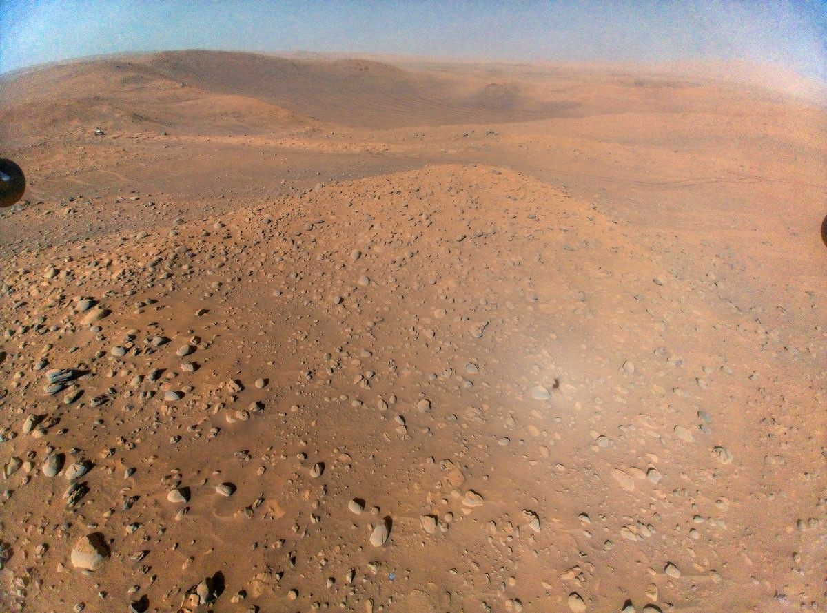 This image of NASA’s Perseverance Mars rover at the rim of Belva Crater was taken by the agency’s Ingenuity Mars Helicopter during the rotorcraft’s 51st flight on April 22, 2023, the 772nd Martian day, or sol, of the rover’s mission.