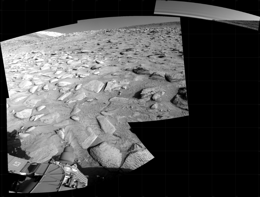 NASA's Mars rover Curiosity took 4 images in Gale Crater using its mast-mounted Right Navigation Camera (Navcam) to create this mosaic. The seam-corrected mosaic provides a 111-degree cylindrical projection panorama of the Martian surface centered at 175 degrees azimuth (measured clockwise from north). Curiosity took the images on April 28, 2023, Sol 3812 of the Mars Science Laboratory mission at drive 714, site number 101. The local mean solar time for the image exposures was 4 PM. Each Navcam image has a 45 degree field of view. CREDIT: NASA/JPL-Caltech