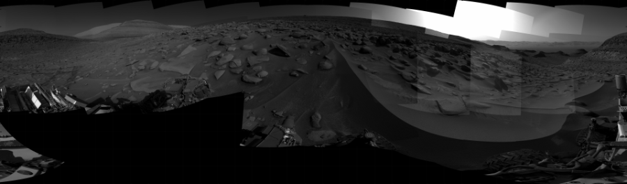 NASA's Mars rover Curiosity took 31 images in Gale Crater using its mast-mounted Right Navigation Camera (Navcam) to create this mosaic. The seam-corrected mosaic provides a 360-degree cylindrical projection panorama of the Martian surface centered at 215 degrees azimuth (measured clockwise from north). Curiosity took the images on May 26, 2023, Sol 3839 of the Mars Science Laboratory mission at drive 1138, site number 101. The local mean solar time for the image exposures was from 3 PM to 4 PM. Each Navcam image has a 45 degree field of view. CREDIT: NASA/JPL-Caltech