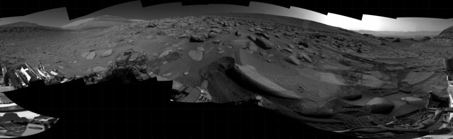 NASA's Mars rover Curiosity took 31 images in Gale Crater using its mast-mounted Right Navigation Camera (Navcam) to create this mosaic. The seam-corrected mosaic provides a 360-degree cylindrical projection panorama of the Martian surface centered at 209 degrees azimuth (measured clockwise from north). Curiosity took the images on June 07, 2023, Sol 3851 of the Mars Science Laboratory mission at drive 1402, site number 101. The local mean solar time for the image exposures was from 2 PM to 3 PM. Each Navcam image has a 45 degree field of view. CREDIT: NASA/JPL-Caltech