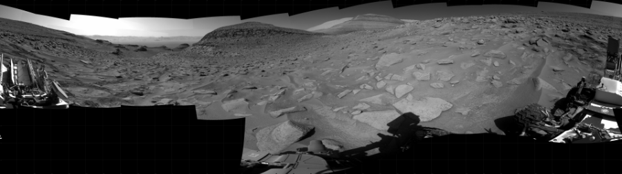NASA's Mars rover Curiosity took 31 images in Gale Crater using its mast-mounted Right Navigation Camera (Navcam) to create this mosaic. The seam-corrected mosaic provides a 360-degree cylindrical projection panorama of the Martian surface centered at 80 degrees azimuth (measured clockwise from north). Curiosity took the images on June 13, 2023, Sol 3857 of the Mars Science Laboratory mission at drive 1606, site number 101. The local mean solar time for the image exposures was 2 PM. Each Navcam image has a 45 degree field of view. CREDIT: NASA/JPL-Caltech