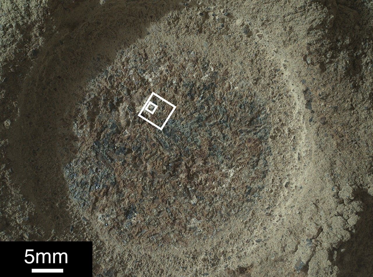 This image is of a rock target nicknamed “Quartier,” which was studied by the SHERLOC instrument aboard NASA’s Perseverance Mars rover. The white square shows the area that SHERLOC zapped with its ultraviolet laser.
