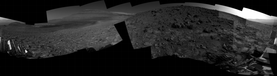 NASA's Mars rover Curiosity took 24 images in Gale Crater using its mast-mounted Right Navigation Camera (Navcam) to create this mosaic. The seam-corrected mosaic provides a 360-degree cylindrical projection panorama of the Martian surface centered at 163 degrees azimuth (measured clockwise from north). Curiosity took the images on August 18, 2023, Sol 3921 of the Mars Science Laboratory mission at drive 1528, site number 103. The local mean solar time for the image exposures was 3 PM. Each Navcam image has a 45 degree field of view. CREDIT: NASA/JPL-Caltech