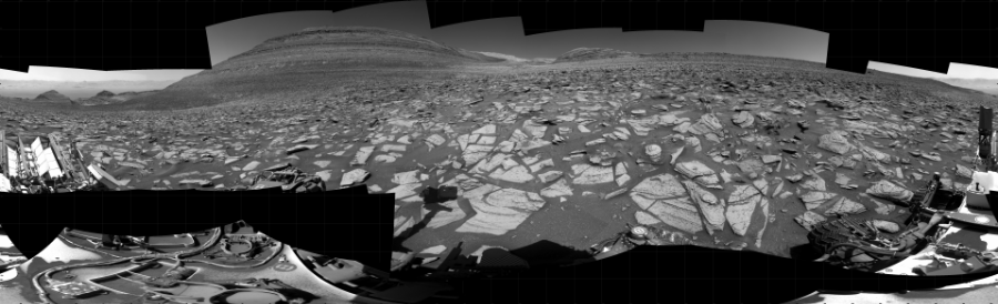 NASA's Mars rover Curiosity took 28 images in Gale Crater using its mast-mounted Right Navigation Camera (Navcam) to create this mosaic. The seam-corrected mosaic provides a 360-degree cylindrical projection panorama of the Martian surface centered at 143 degrees azimuth (measured clockwise from north). Curiosity took the images on October 12, 2023, Sols 3975-3974 of the Mars Science Laboratory mission at drive 418, site number 105. The local mean solar time for the image exposures was from 1 PM to 12 PM. Each Navcam image has a 45 degree field of view. CREDIT: NASA/JPL-Caltech