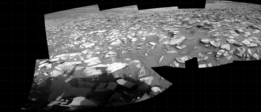 NASA's Mars rover Curiosity took 7 images in Gale Crater using its mast-mounted Right Navigation Camera (Navcam) to create this mosaic. The seam-corrected mosaic provides a 203-degree cylindrical projection panorama of the Martian surface centered at 122 degrees azimuth (measured clockwise from north). Curiosity took the images on December 06, 2023, Sol 4028 of the Mars Science Laboratory mission at drive 490, site number 105. The local mean solar time for the image exposures was from 2 PM to 3 PM. Each Navcam image has a 45 degree field of view. CREDIT: NASA/JPL-Caltech