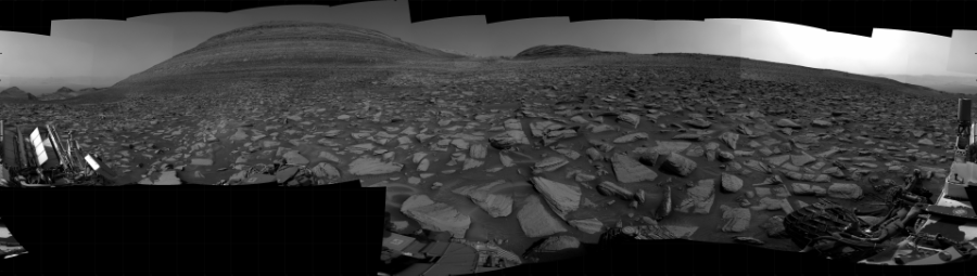 NASA's Mars rover Curiosity took 31 images in Gale Crater using its mast-mounted Right Navigation Camera (Navcam) to create this mosaic. The seam-corrected mosaic provides a 360-degree cylindrical projection panorama of the Martian surface centered at 155 degrees azimuth (measured clockwise from north). Curiosity took the images on December 18, 2023, Sol 4040 of the Mars Science Laboratory mission at drive 1014, site number 105. The local mean solar time for the image exposures was 2 PM. Each Navcam image has a 45 degree field of view. CREDIT: NASA/JPL-Caltech