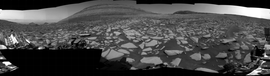 NASA's Mars rover Curiosity took 31 images in Gale Crater using its mast-mounted Right Navigation Camera (Navcam) to create this mosaic. The seam-corrected mosaic provides a 360-degree cylindrical projection panorama of the Martian surface centered at 115 degrees azimuth (measured clockwise from north). Curiosity took the images on January 16, 2024, Sol 4068 of the Mars Science Laboratory mission at drive 1684, site number 105. The local mean solar time for the image exposures was from 1 PM to 2 PM. Each Navcam image has a 45 degree field of view. CREDIT: NASA/JPL-Caltech