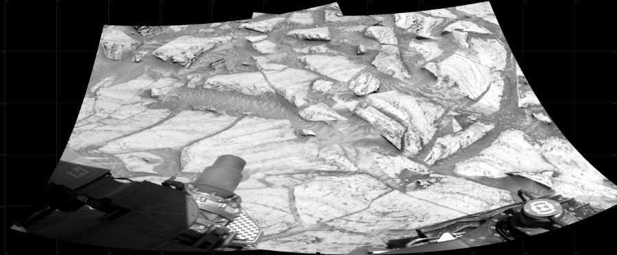 NASA's Mars rover Curiosity took 2 images in Gale Crater using its mast-mounted Right Navigation Camera (Navcam) to create this mosaic. The seam-corrected mosaic provides a 119-degree cylindrical projection panorama of the Martian surface centered at 109 degrees azimuth (measured clockwise from north). Curiosity took the images on February 12, 2024, Sol 4094 of the Mars Science Laboratory mission at drive 138, site number 106. The local mean solar time for the image exposures was 1 PM. Each Navcam image has a 45 degree field of view. CREDIT: NASA/JPL-Caltech