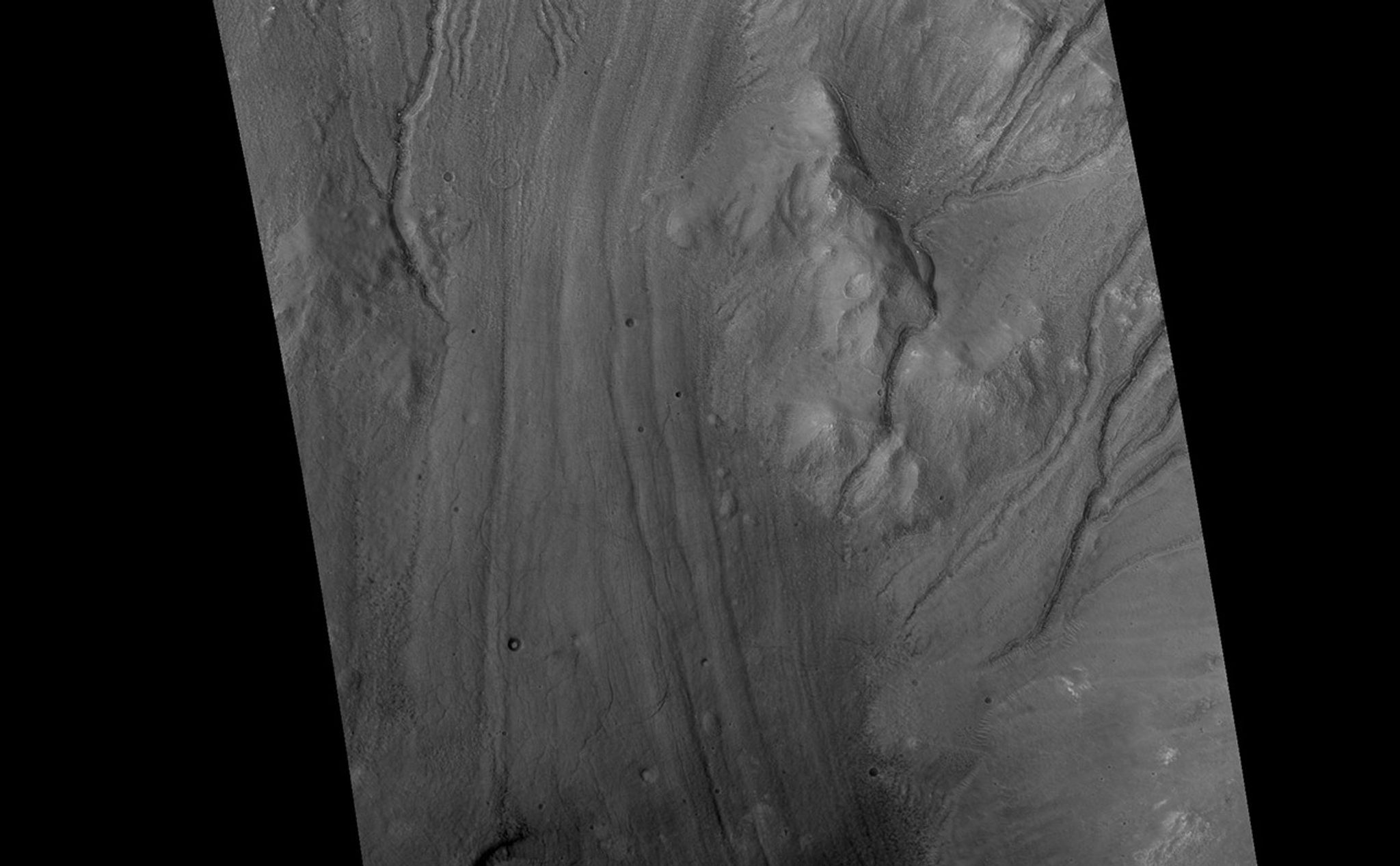 Gullies and Flow Features on Crater Wall