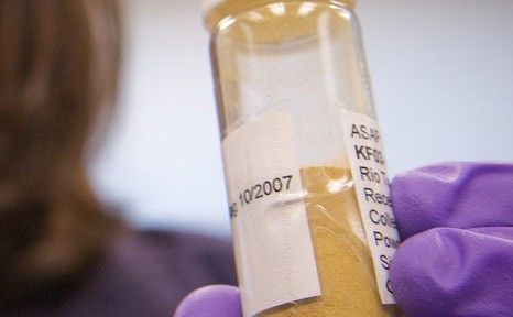 Image of Jennifer Eigenbrode using a soil simulant