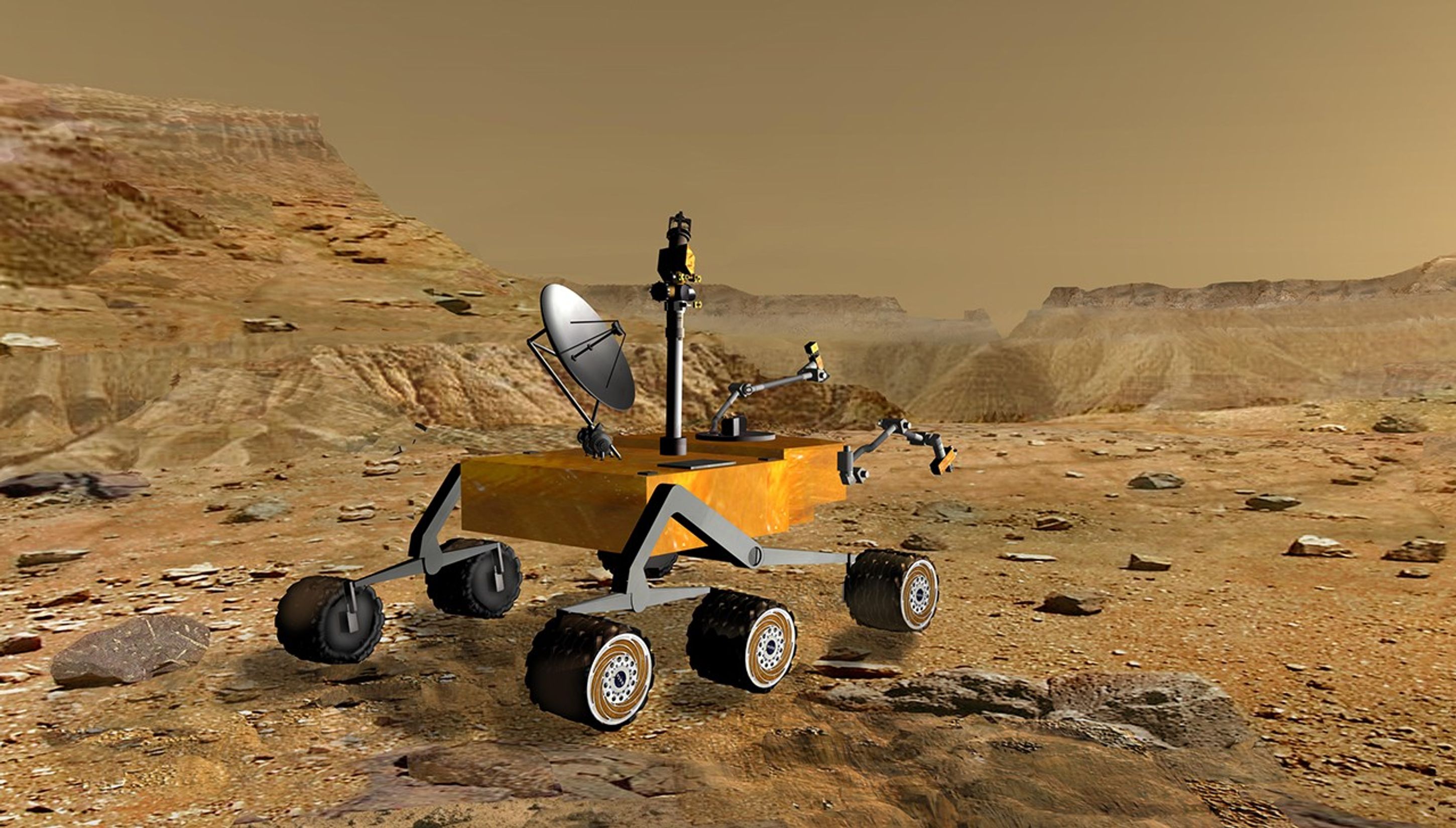 NASA's Mars Science Laboratory travels near a canyon on Mars in this artist's concept. The mission is under development for launch in 2009 and a precision landing on Mars in 2010.
