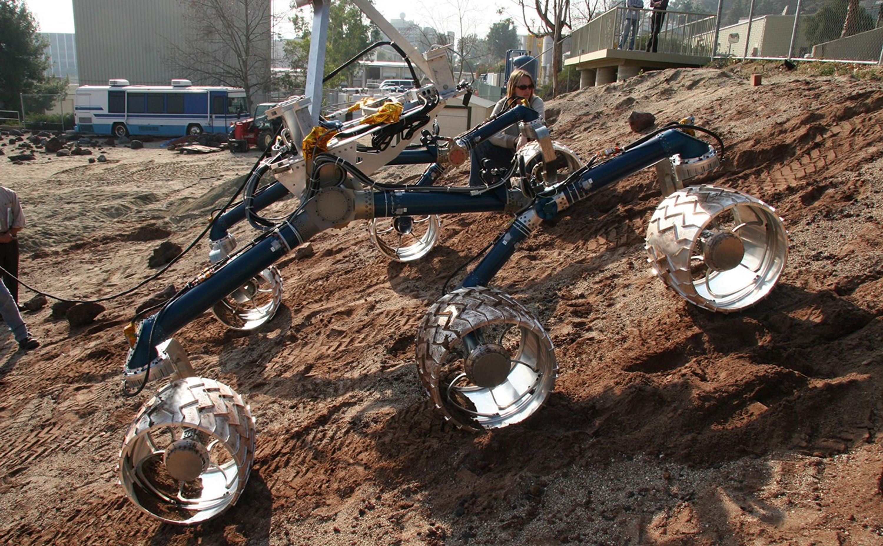 An engineering model for NASA's Mars Science Laboratory makes its way up a hill in the Mars Yard testing area at NASA's Jet Propulsion Laboratory.