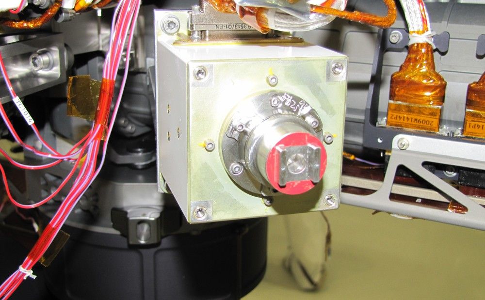 The sensor head on the Alpha Particle X-ray Spectrometer instrument was installed during testing at NASA's Jet Propulsion Laboratory. The instrument is part of the Curiosity rover, which will fly on NASA's Mars Science Laboratory mission. For perspective, the sensor head is 7.8 centimeters, or about 3 inches tall.