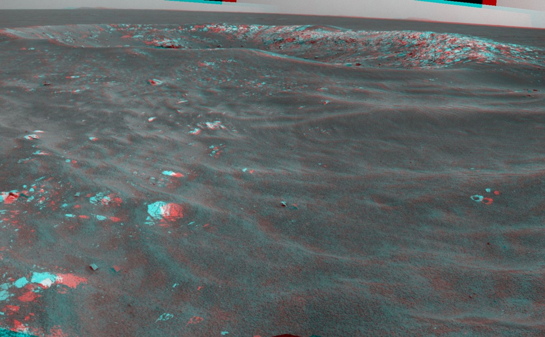 NASA's Mars Exploration Rover Opportunity recorded this stereo view of a crater informally named "Freedom 7" shortly before the 50th anniversary of the first American in space: astronaut Alan Shepard's flight in the Freedom 7 spacecraft.