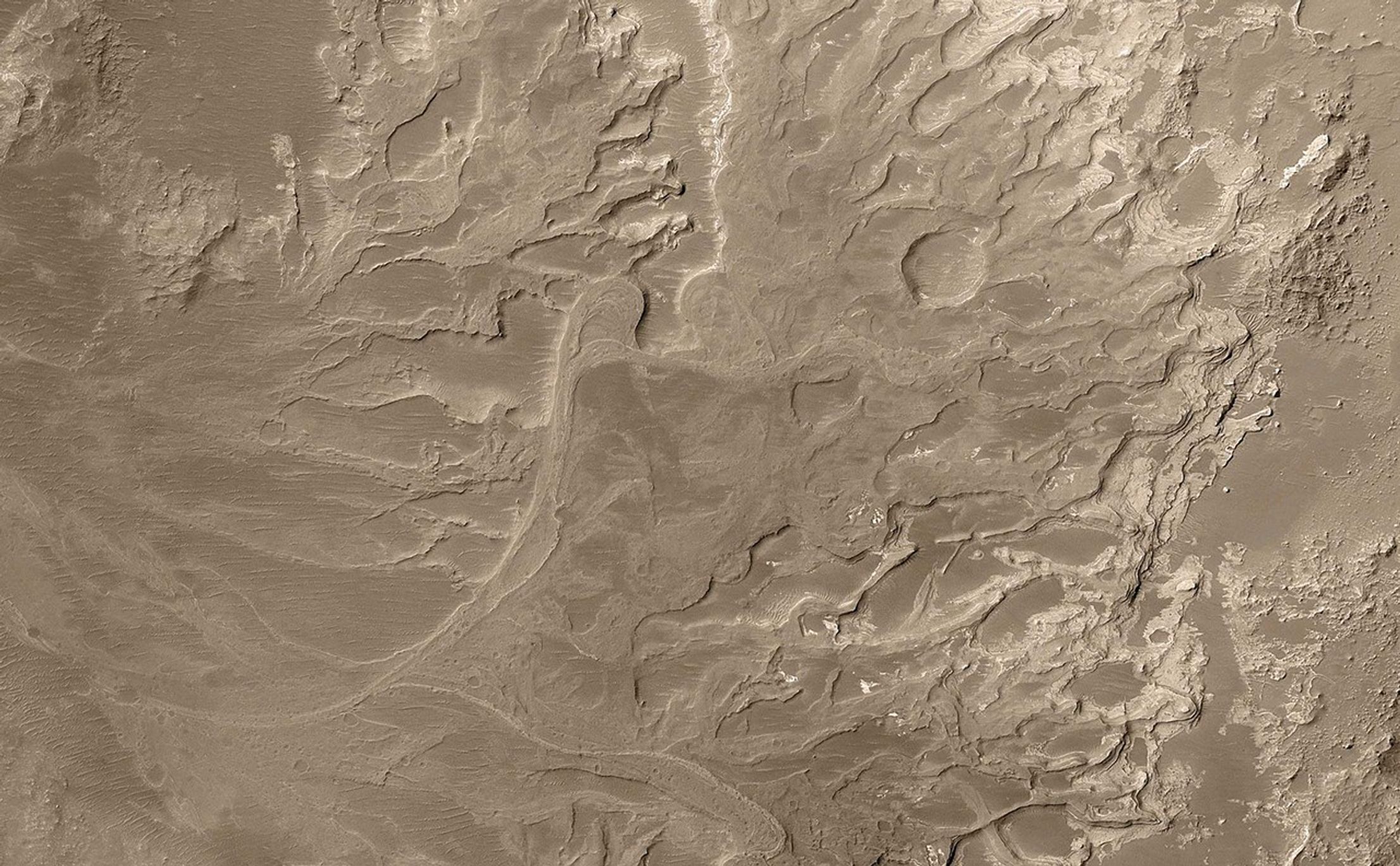 Scientifically, perhaps the most important result from use of the Mars Orbiter Camera on NASA's Mars Global Surveyor during that spacecraft's extended mission has been the discovery and documentation of a fossil delta.