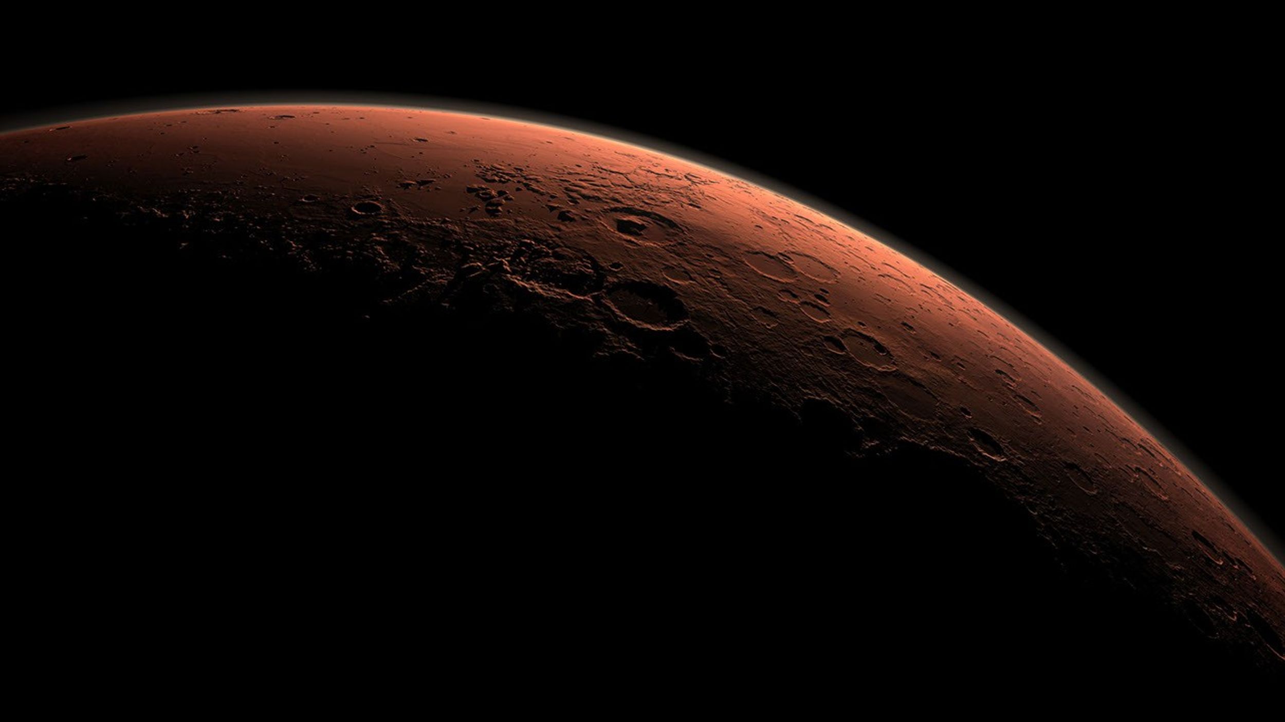 This computer-generated view depicts part of Mars at the boundary between darkness and daylight, with an area including Gale Crater beginning to catch morning light.