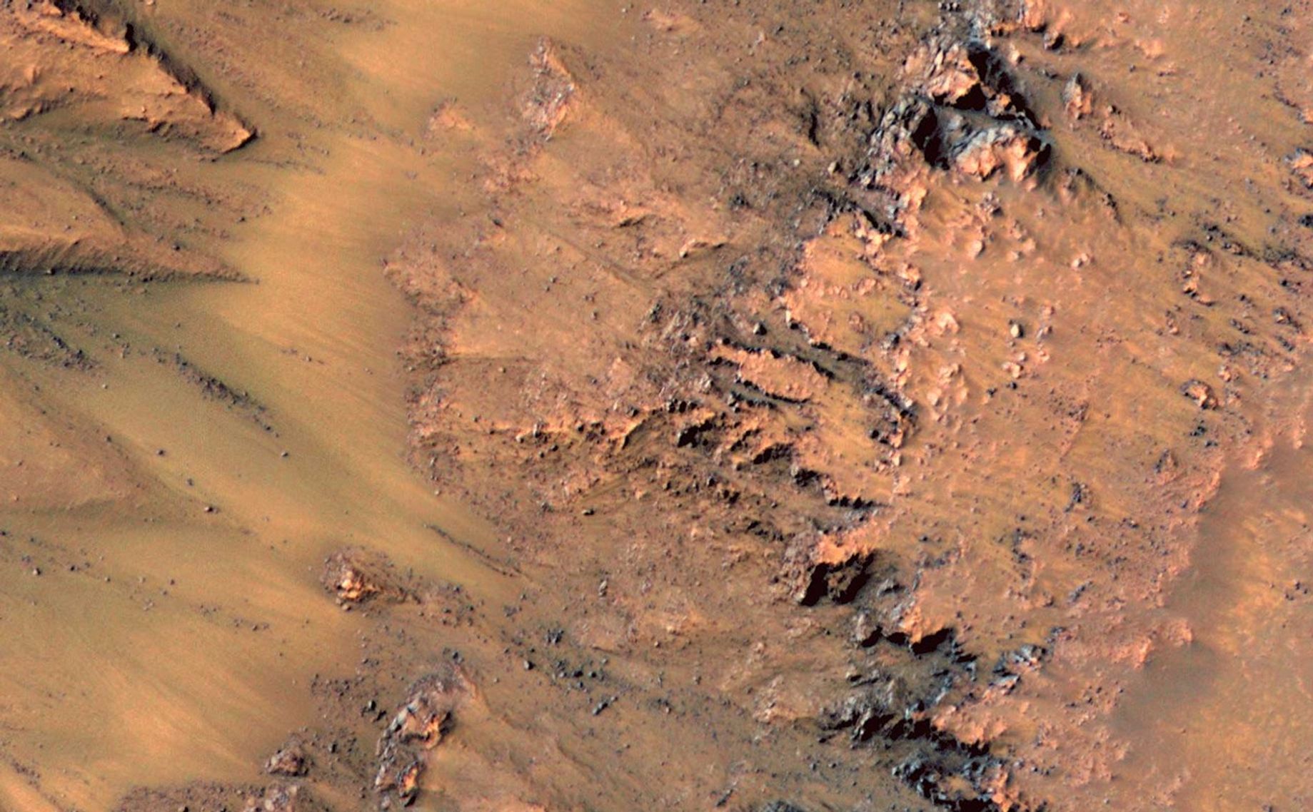 This series of images shows warm-season features that might be evidence of salty liquid water active on Mars today.