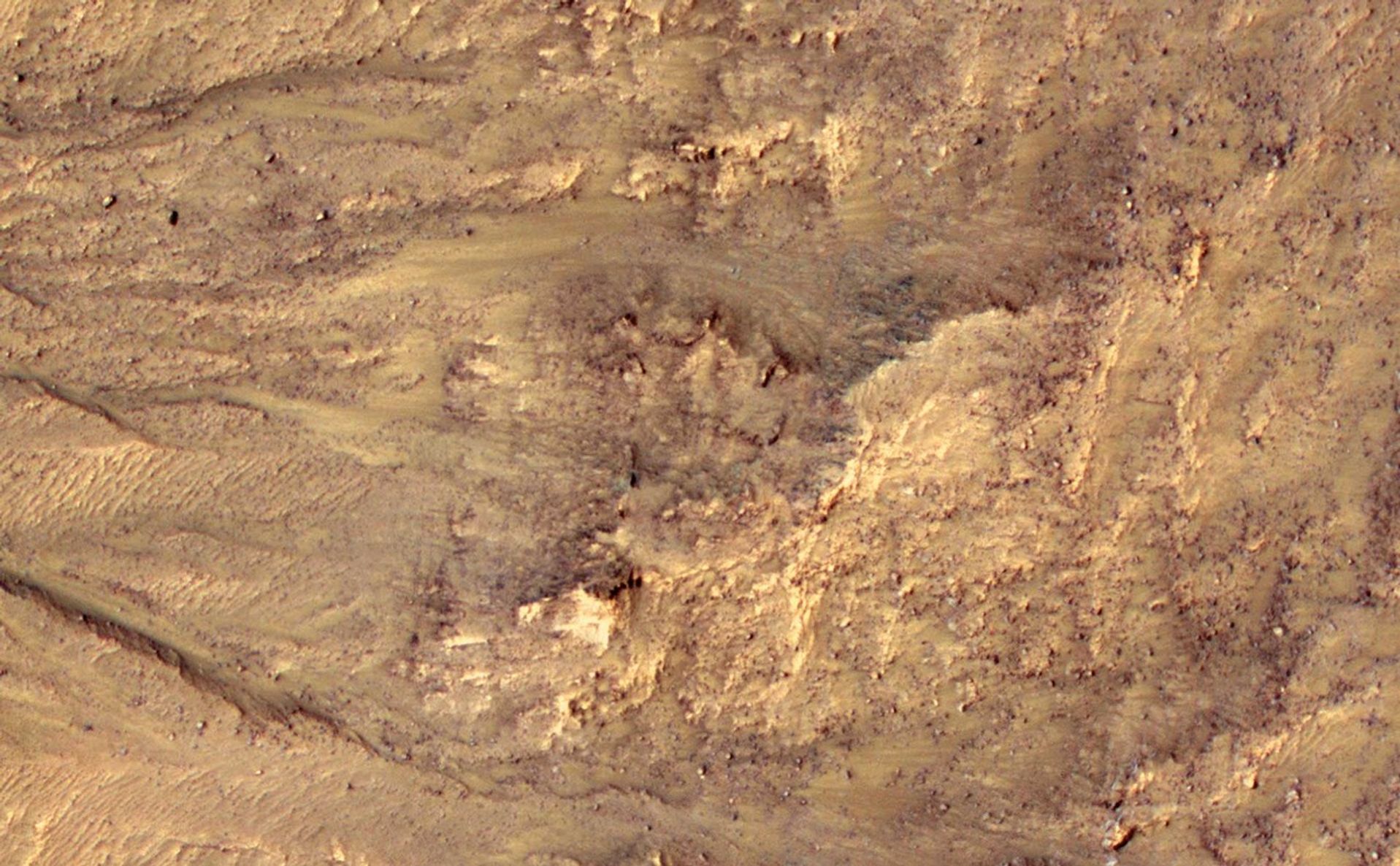 This series of images shows warm-season features that might be evidence of salty liquid water active on Mars today.