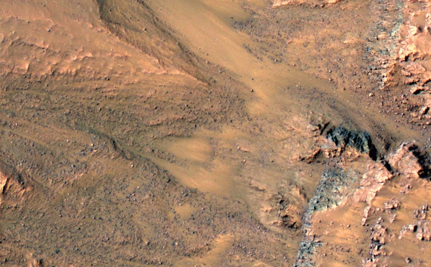This series of images shows warm-season features that might be evidence of salty liquid water active on Mars today.